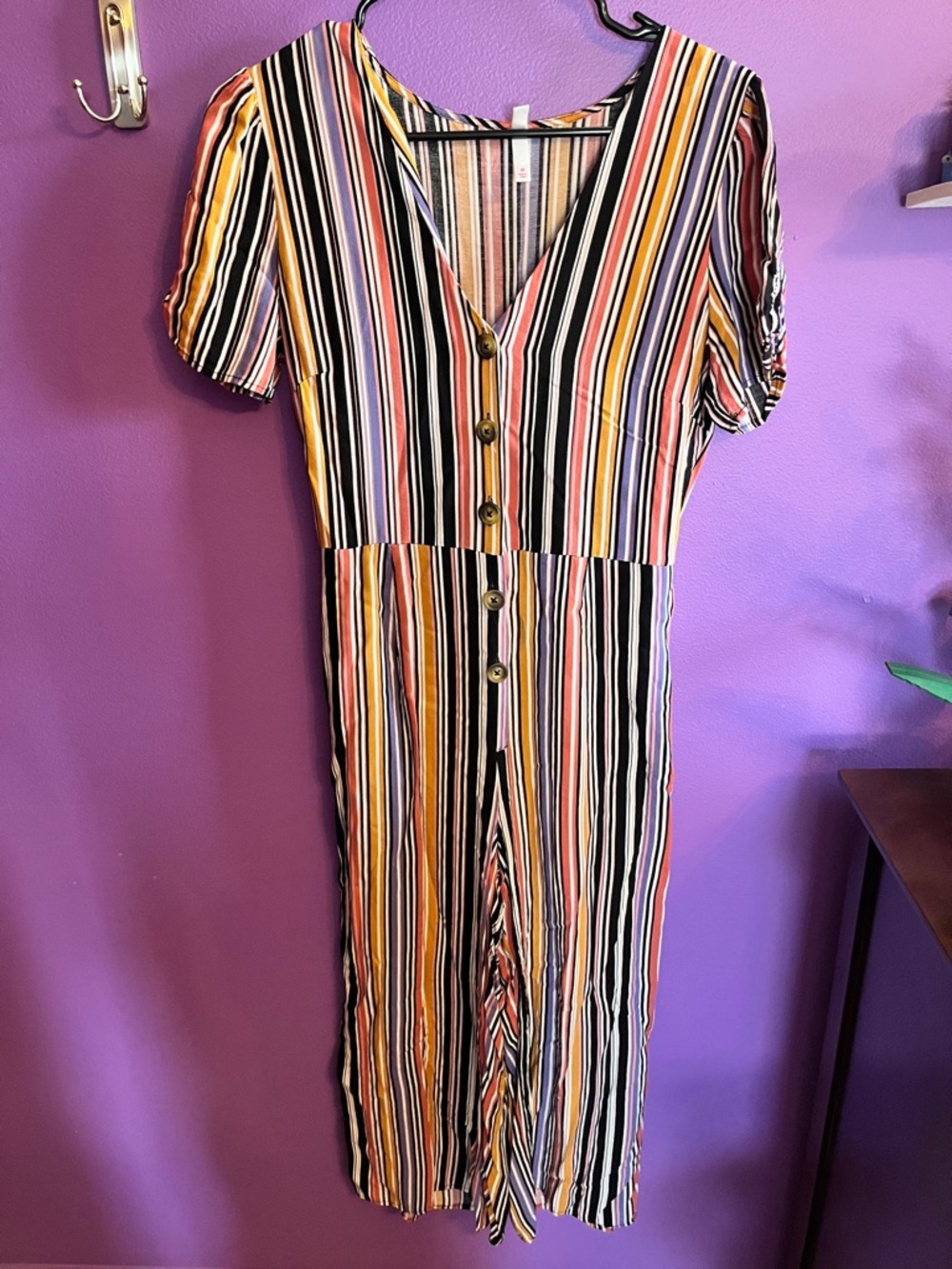 Striped V-Neck Jumpsuit in Black, Pink, Yellow, and Purple